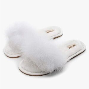 Wedding slippers, worn once while I had my hair and makeup done before wedding.